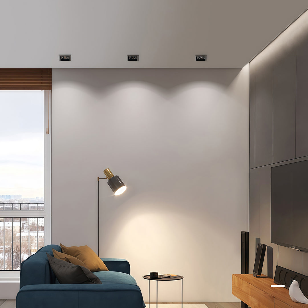 Close-up white LED indoor spotlight module with glass shade chandelier inspired concentric ring reflector design.