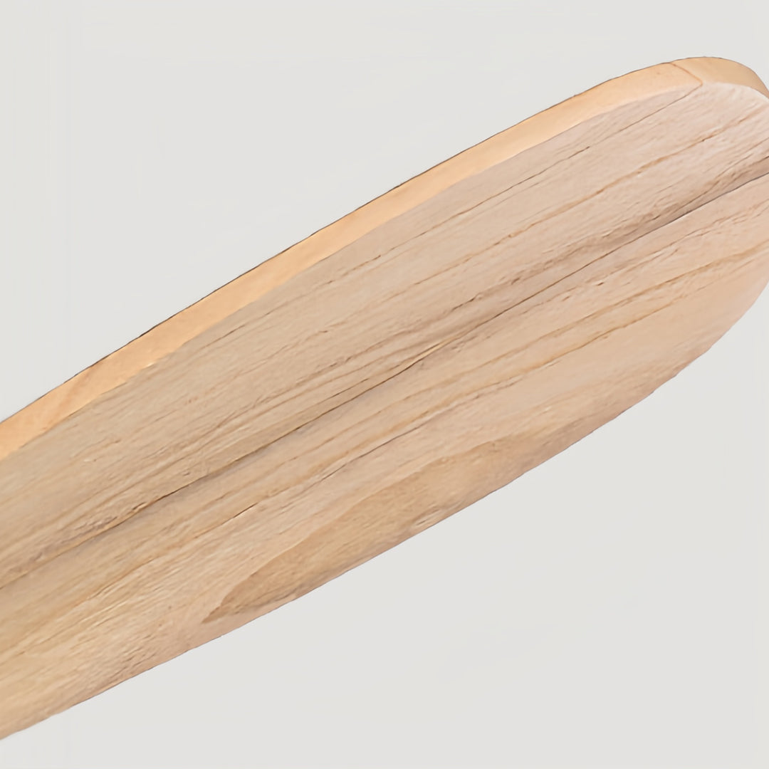 Close-up detail of 3 blade ceiling fan with light showing wood grain texture and craftsmanship