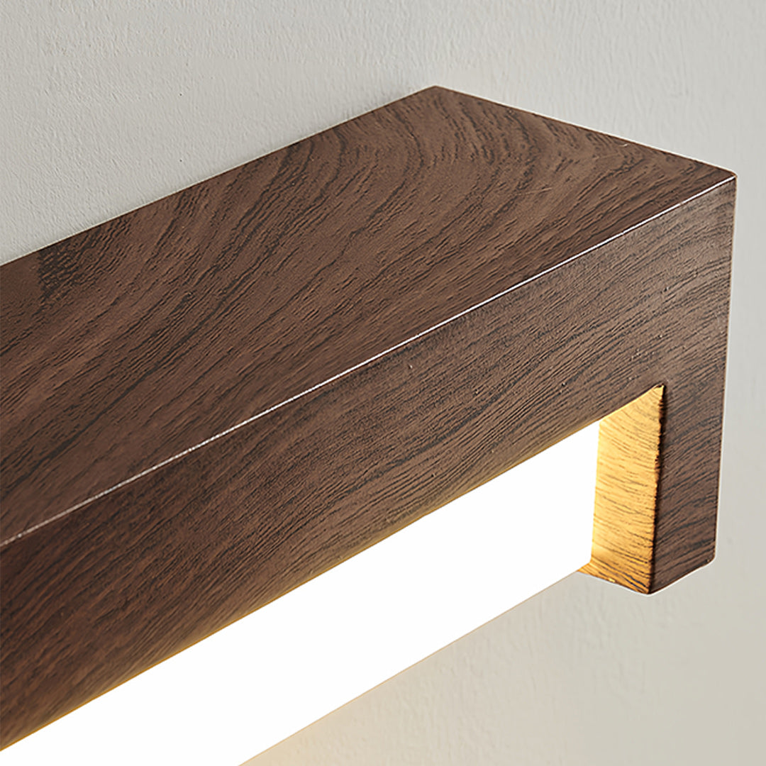 Close-up detail of wall mounted led lights showing wood grain texture and LED integration