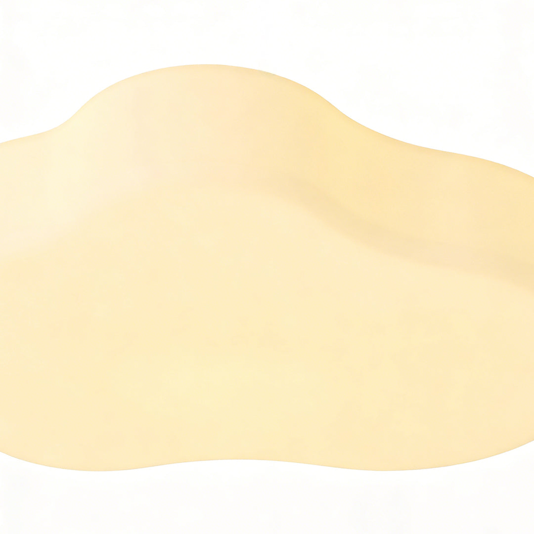 Cloud-shaped ceiling light providing soft and even light for a comfortable ambiance in a stylish, bright living room.