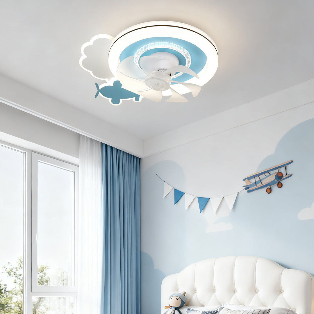 Detailed view of the cloud-shaped children's ceiling fans with lights with small plastic airplane accents in a bright, modern nursery. 