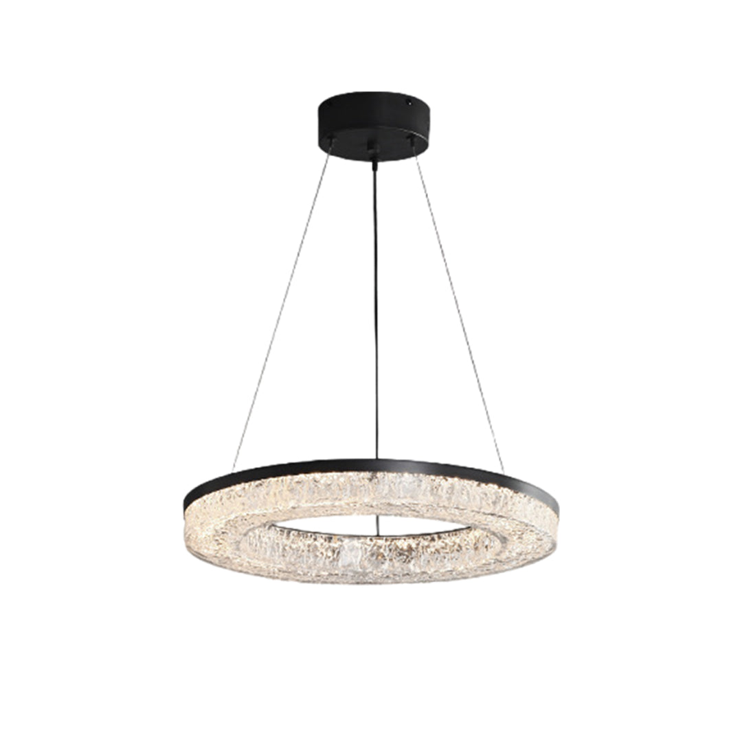 Cluster of circle pendant light with metallic frames, hanging in a modern minimalist arrangement.
