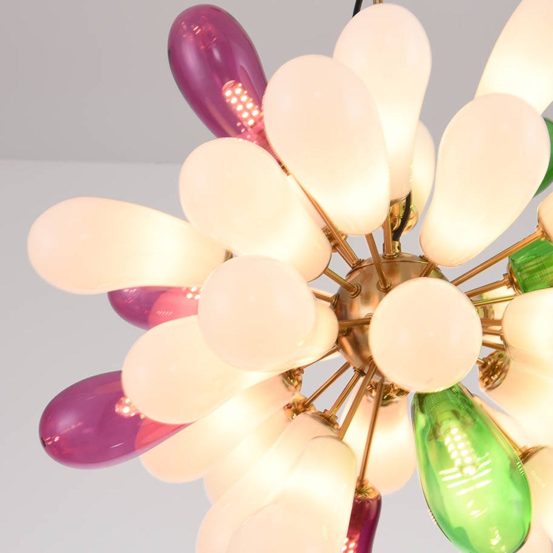 Close-up of colorful glass bulbs on a modern chandelier showing vibrant tones and gold metal frame.