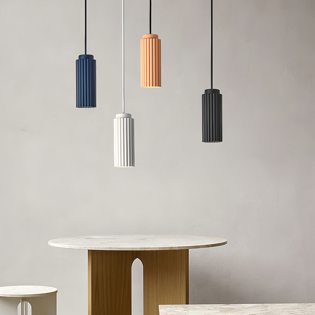 Colorful metal pendants light creating warm kitchen island lighting atmosphere