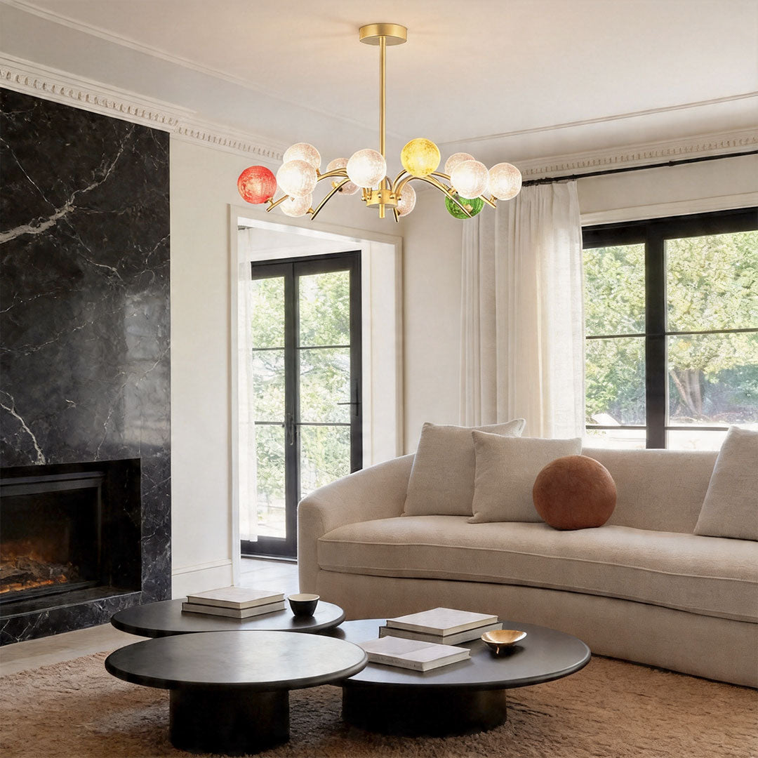 Modern coloured glass chandelier in living room with multi-globe arrangement.