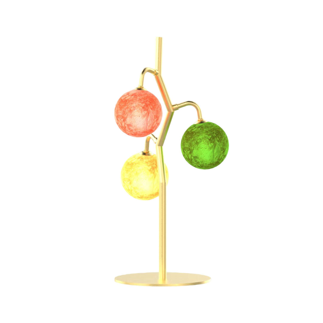 Minimalist coloured glass table lamp isolated on white background.