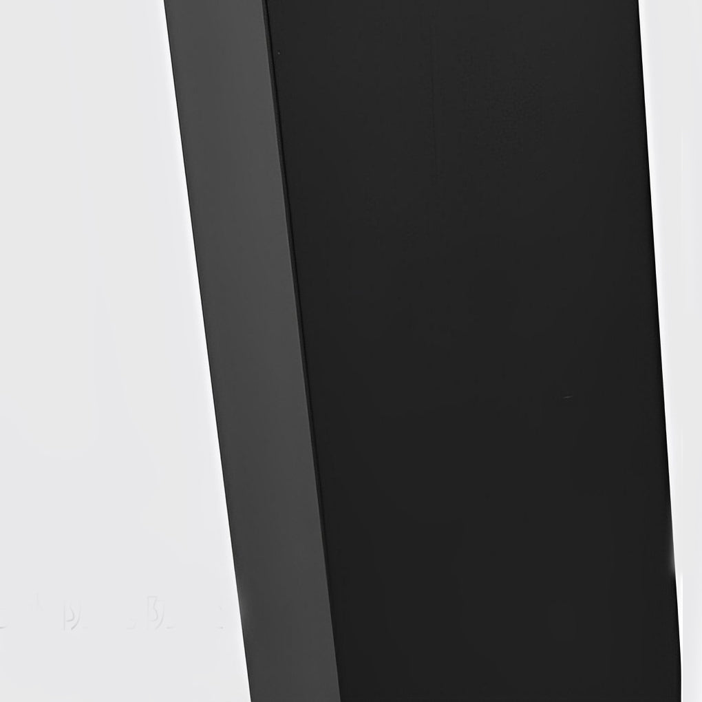 Commercial bollard lights with clean black exterior and illuminated top for outdoor landscape lighting.