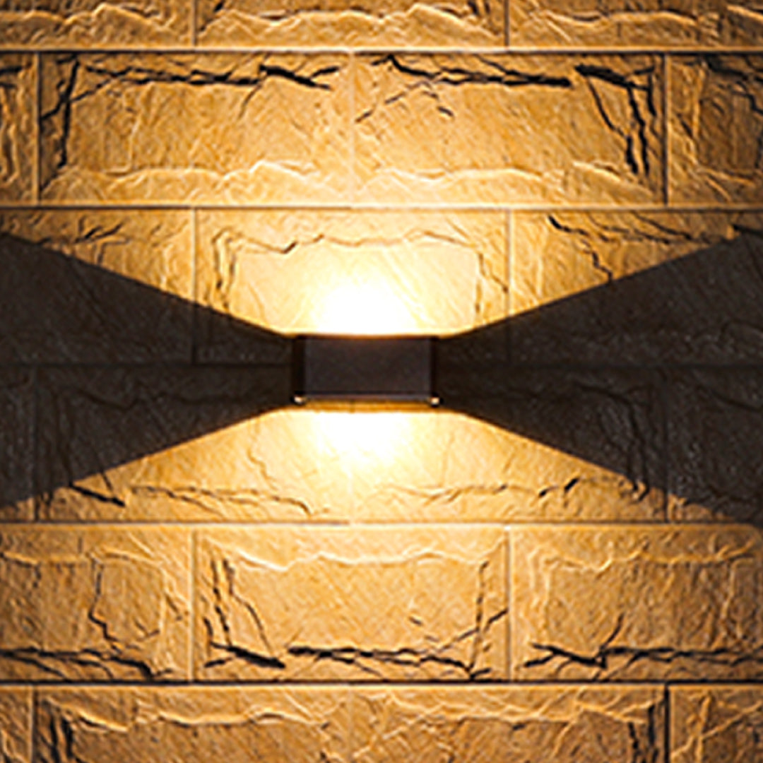 Modern black rectangular LED wall light with integrated sensor and sleek minimalist design