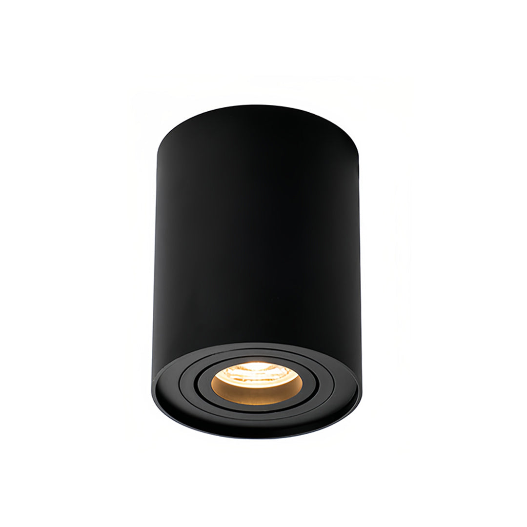 Compact black surface mounted downlight featuring adjustable warm white LED technology