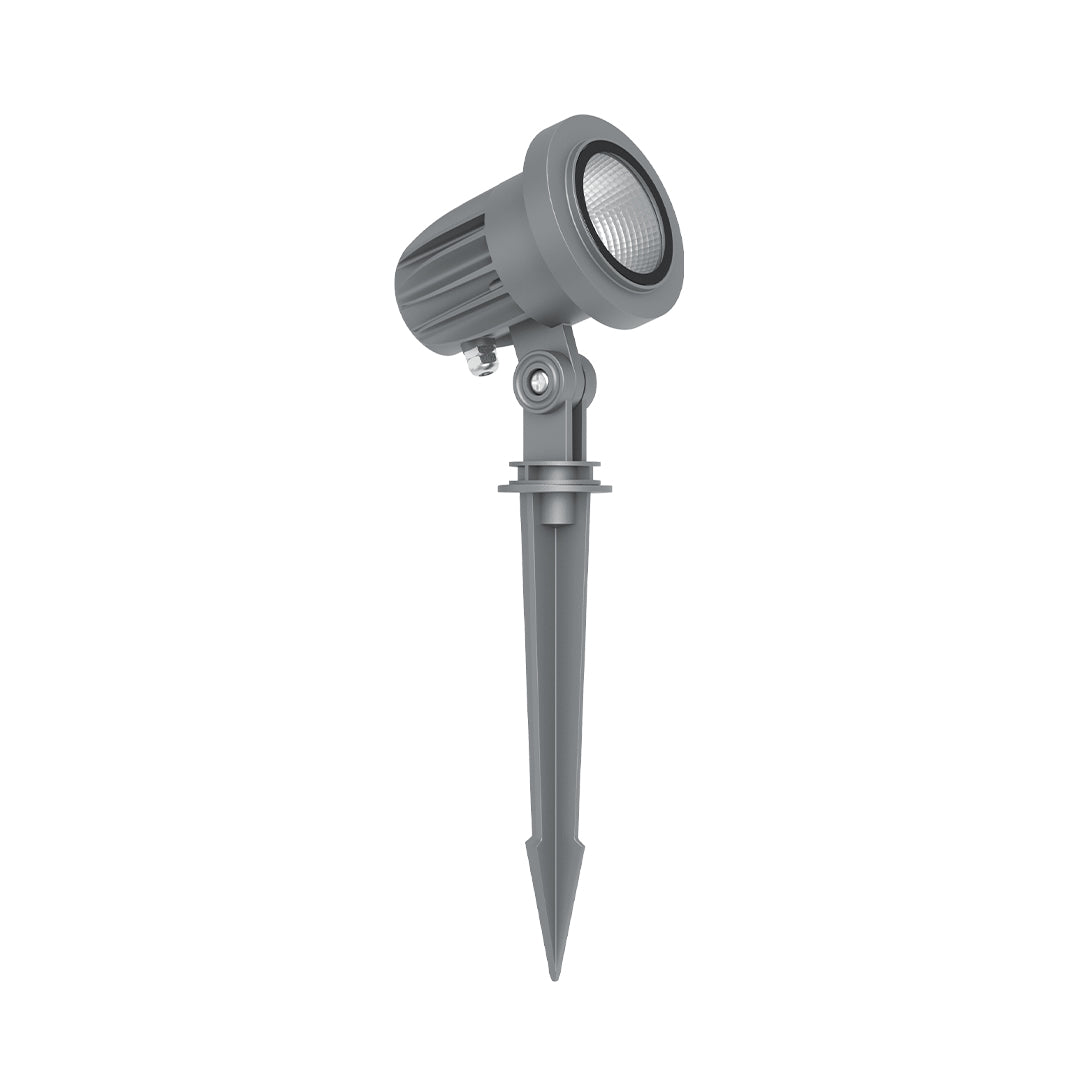 Compact gray LED spotlight with adjustable head and ground stake for precise landscape lighting