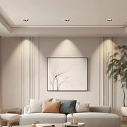 Compact LED indoor ceiling spotlights unit featuring glass shade chandelier aesthetic with white housing and black reflector.