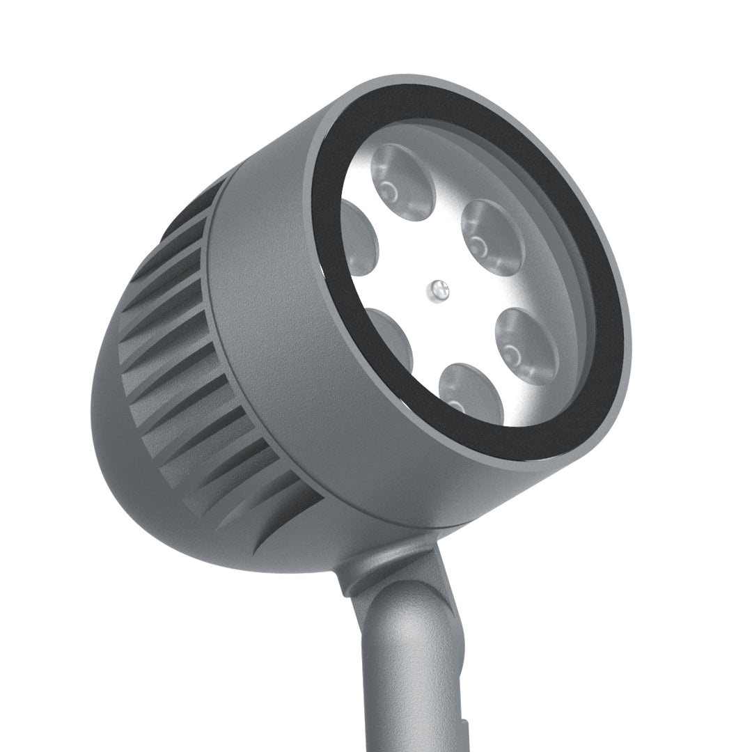 Compact LED spotlight fixture with adjustable head and spike mount design