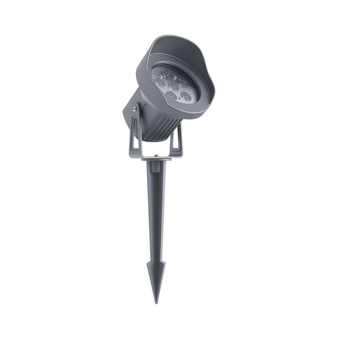 Compact LED spotlight with directional capability and ground stake for targeted outdoor illumination