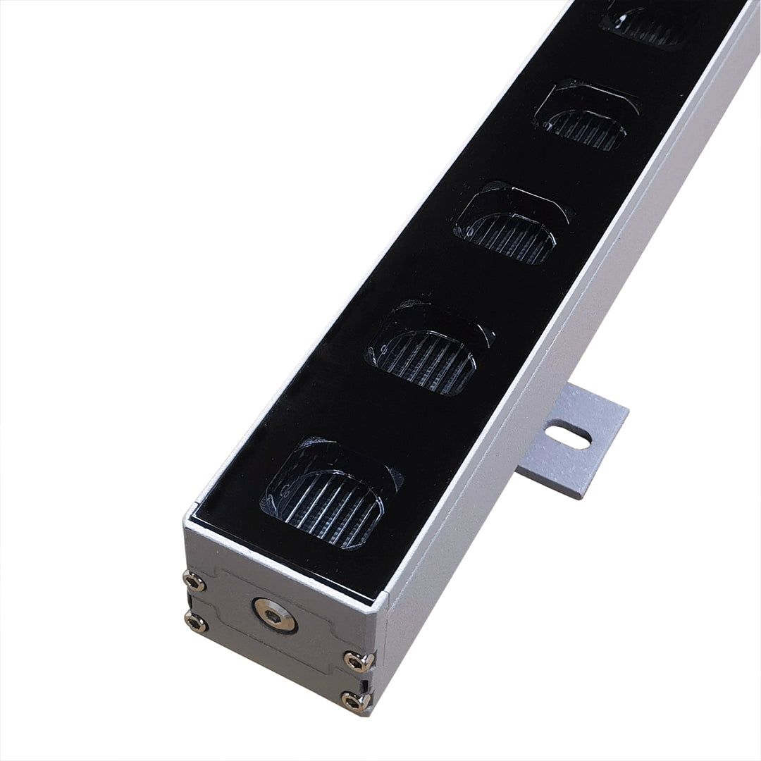 Compact outdoor LED wall wash lighting unit featuring weatherproof construction and mounting hardware