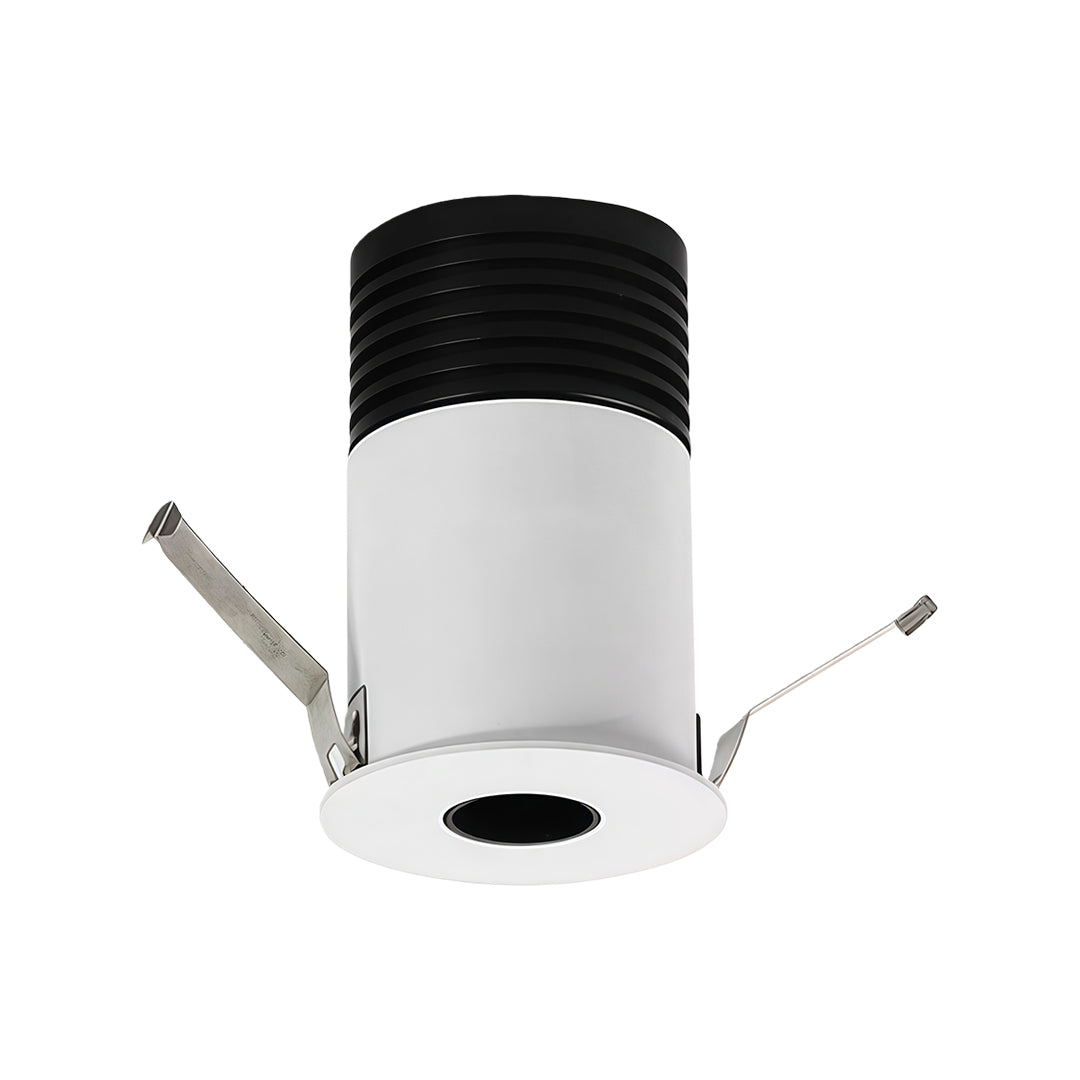 Compact recessed LED ceiling light featuring directional mounting brackets and thermal management design