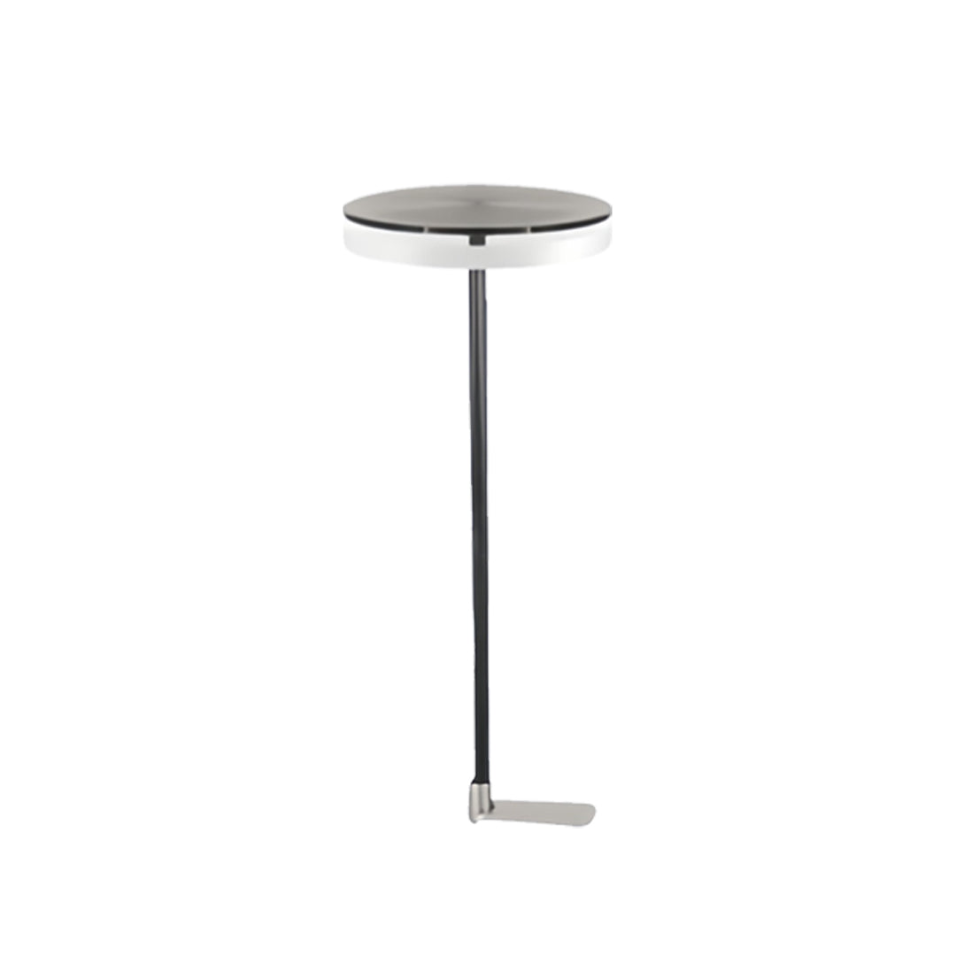 Compact round-top LED stake fixture ideal for illuminating an outdoor lighting path with soft downward light.