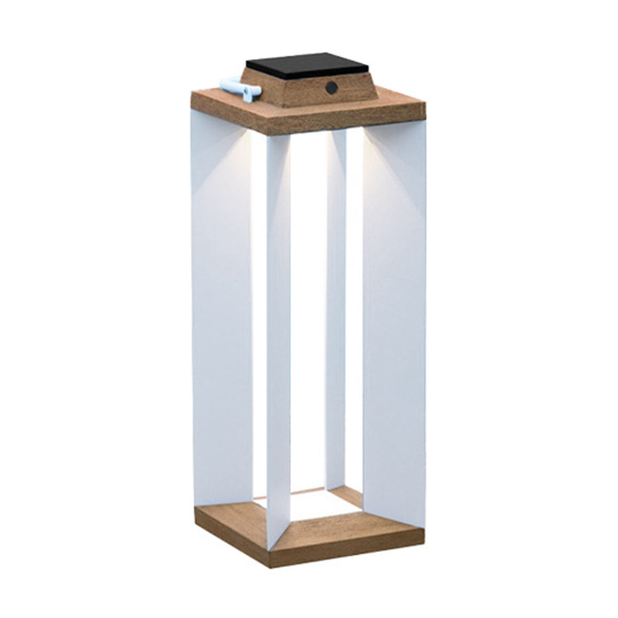 Compact solar lantern with natural wood base and translucent white panels on neutral background