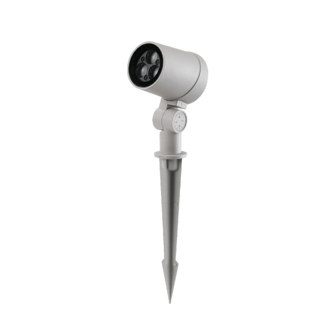 Compact silver tree spotlight fixture with adjustable head and ground stake for landscape lighting installation