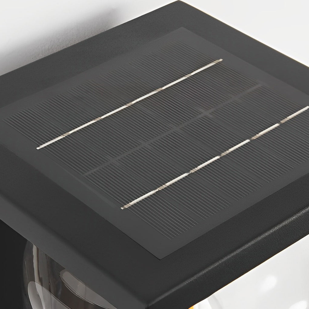 Compound wall lights outdoor with a close-up of their solar panel on top.