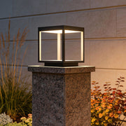 Modern concrete pillar light installed at a residential gate entrance