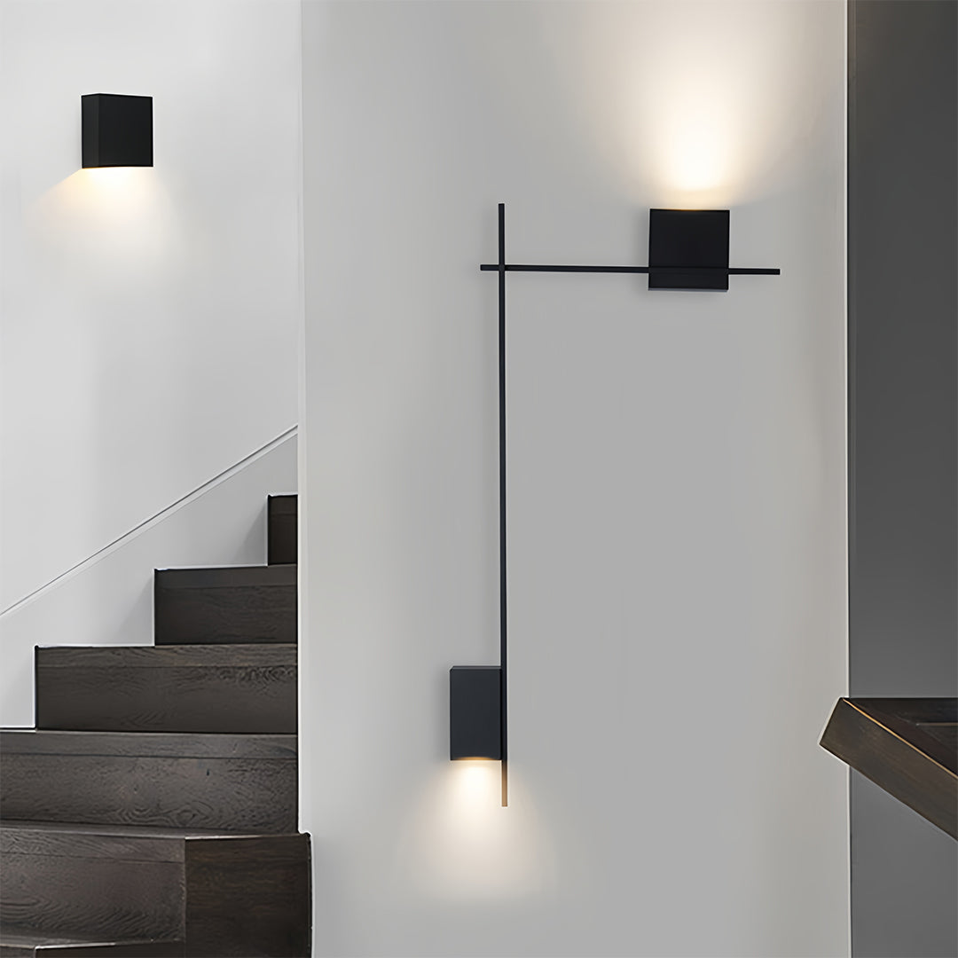 Minimalist decor wall lights illuminating concrete staircase with contemporary architectural lighting design
