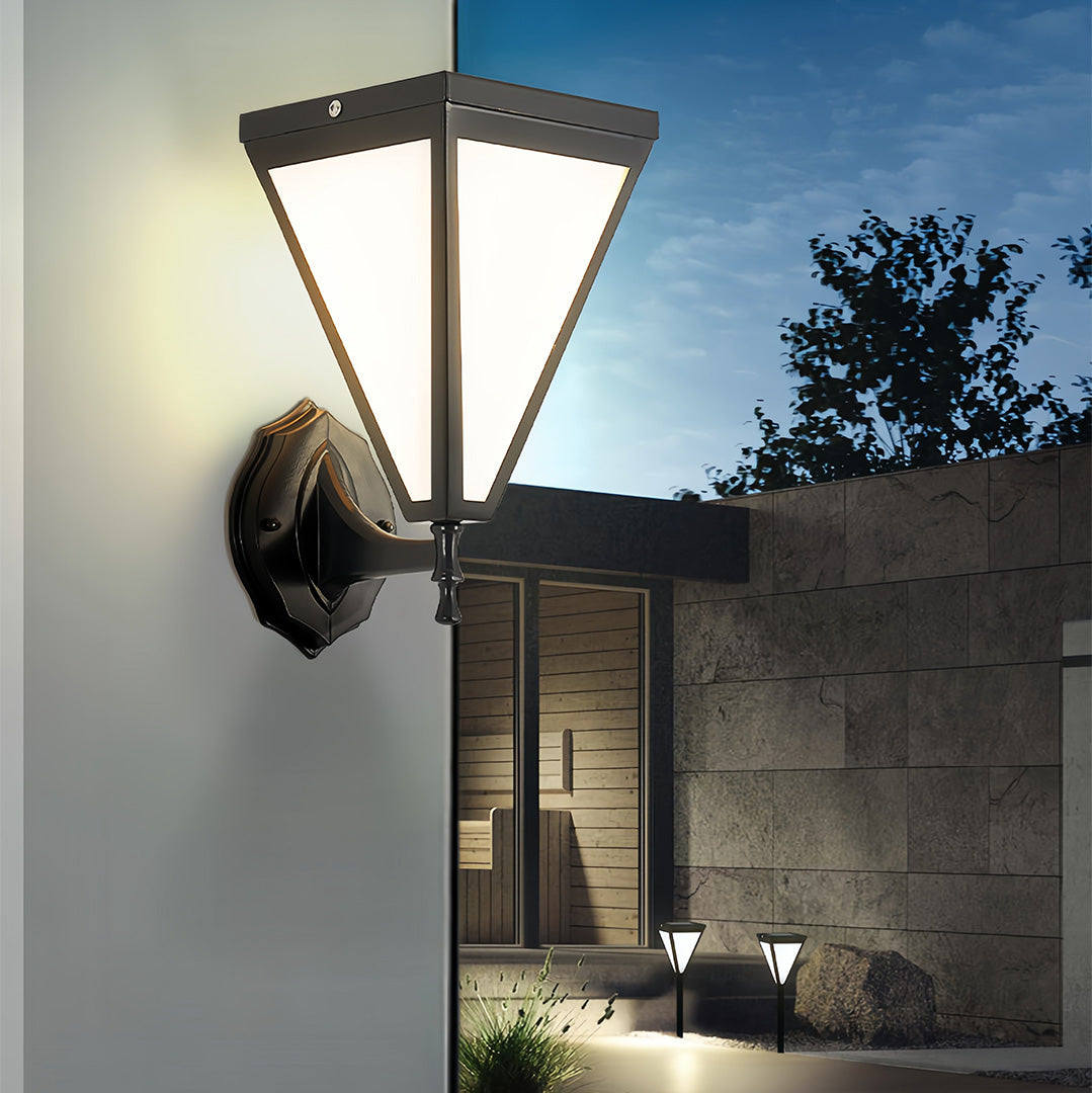 Outdoor solar lights wall mounted on concrete wall creating split warm/cool ambiance.