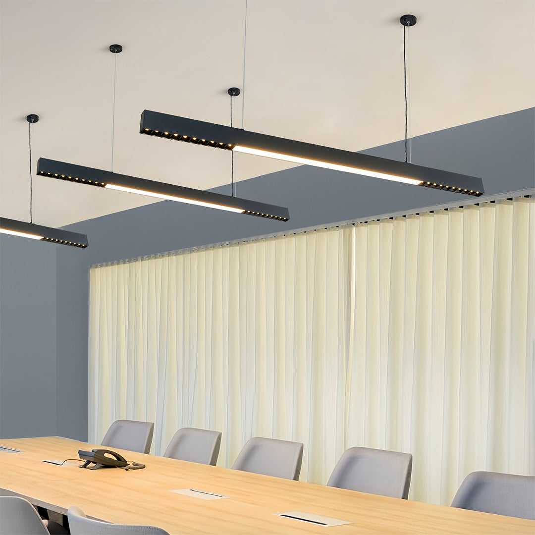 Modern conference room featuring black linear light pendant with professional lighting design