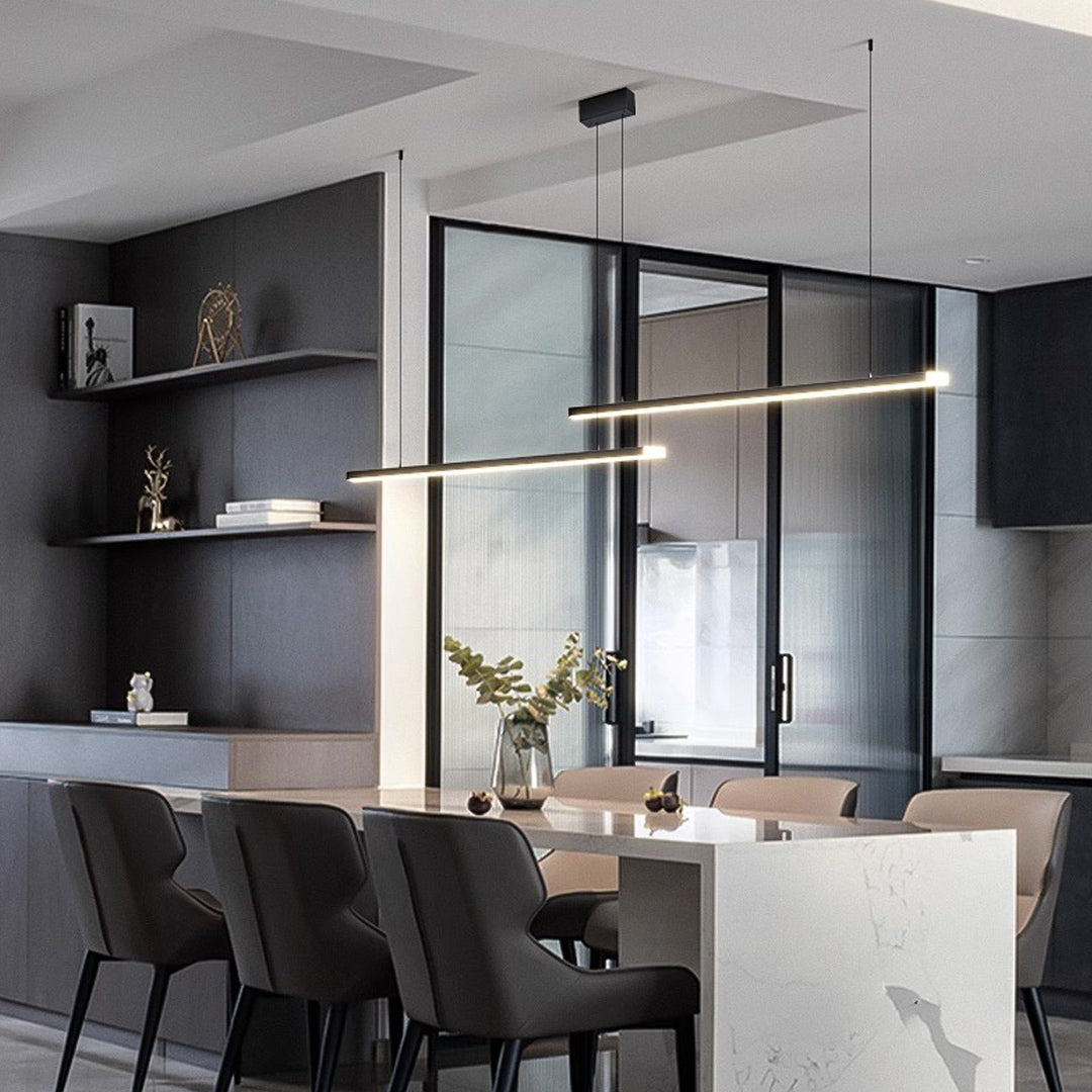 Conference room with small black pendant light providing focused task lighting