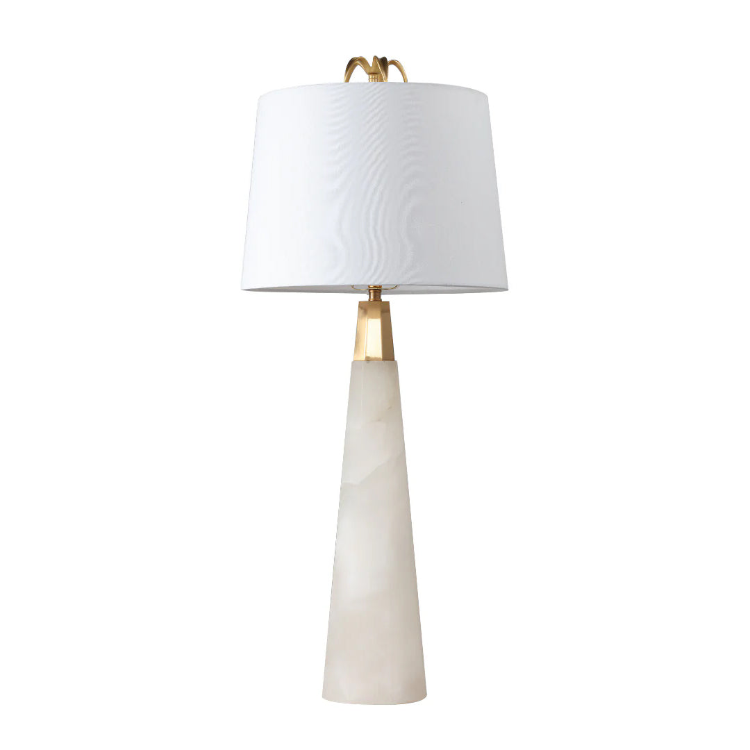 Elegant white marble table lamp with beige lampshade and minimalist style