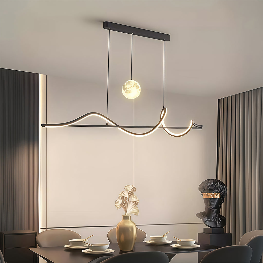 Contemporary art deco pendant light brightening modern dining room with flowing curves and warm LED glow.