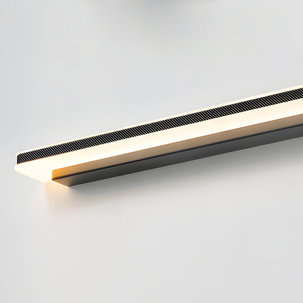 Contemporary bathroom vanity light with soft illumination, showcasing a sleek design above a minimalist mirror.
