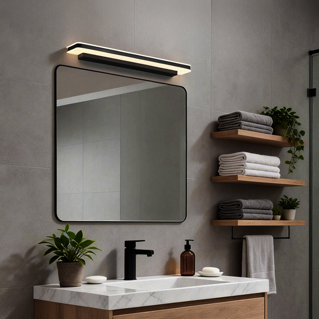 Modern bathroom vanity light above a large bathroom mirror, with a minimalist and elegant design providing soft ambient lighting.