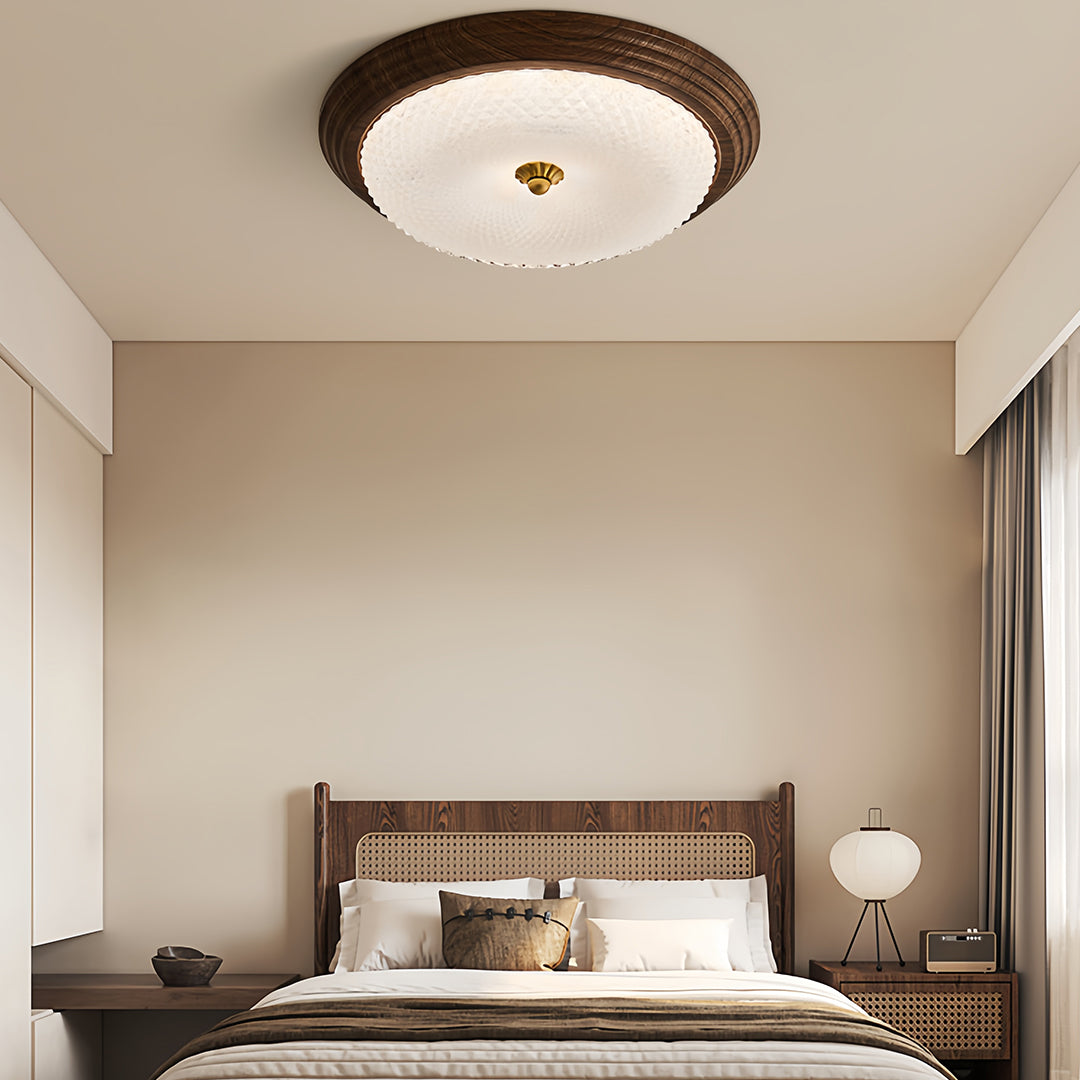 Contemporary bedroom featuring vintage art deco flush mount ceiling light, chic and timeless design