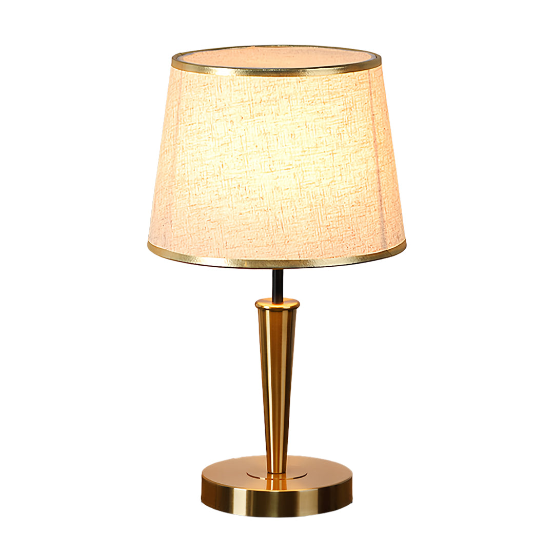 Contemporary brass table lamp with textured white shade and sleek metal base