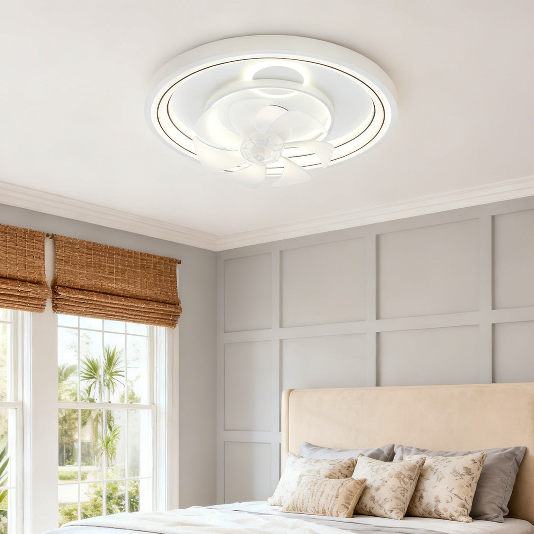 Contemporary ceiling fan with light installed in neutral bedroom with upholstered headboard and bamboo shade