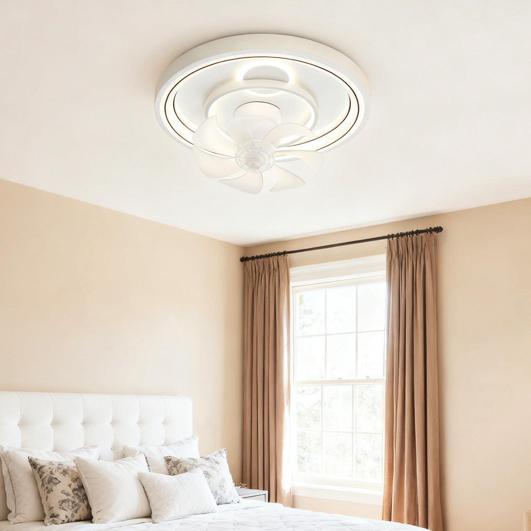 Contemporary ceiling fan with light enhancing warm-toned bedroom with beige walls and neutral bedding