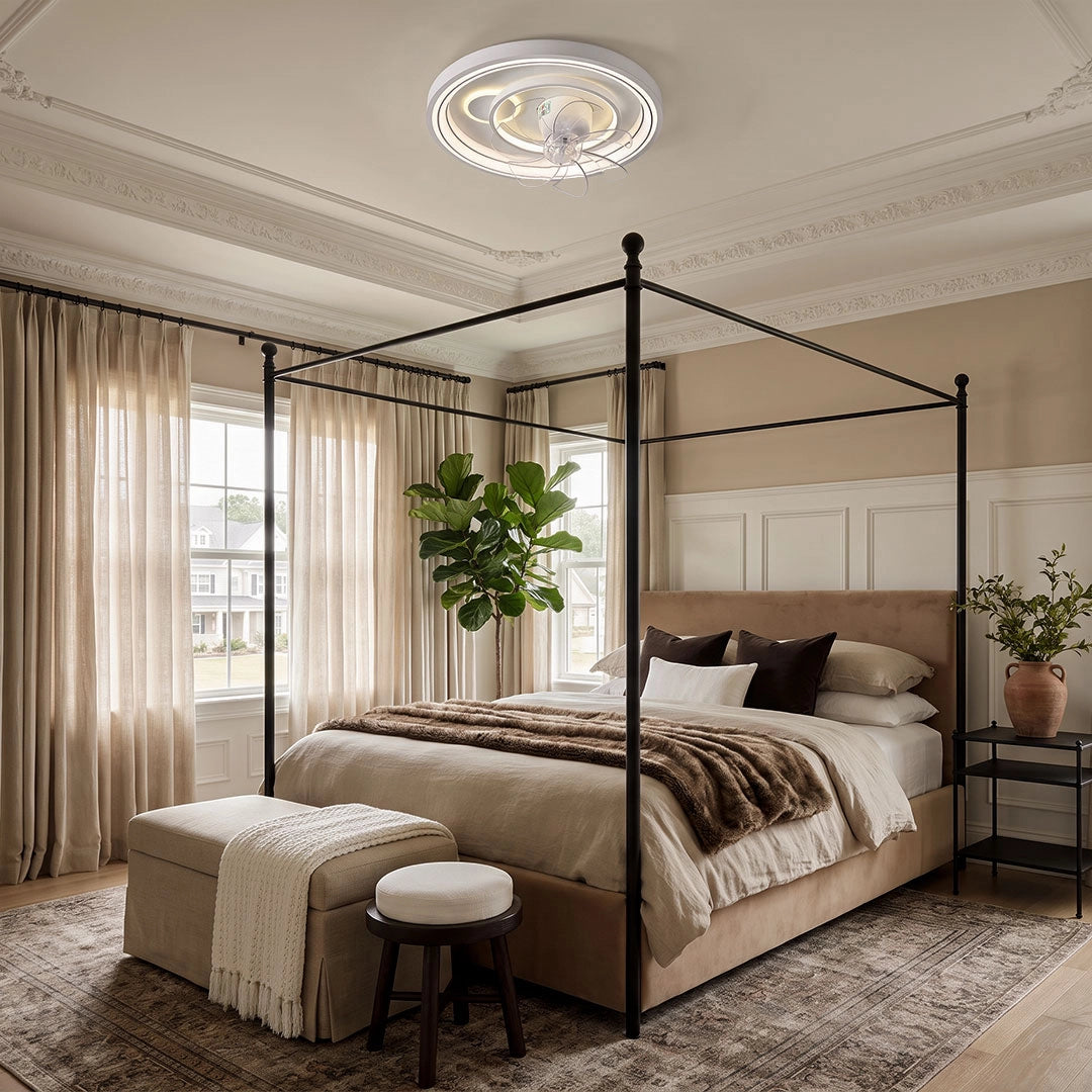 Contemporary ceiling fans with light displayed in a bedroom with a four-poster bed and elegant ceiling molding.