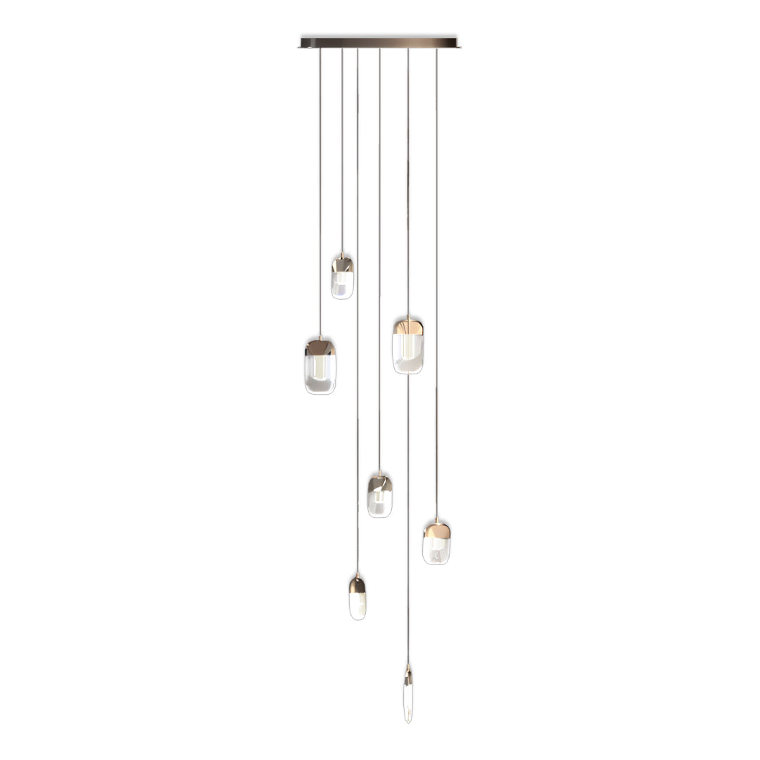 Contemporary chandelier for staircase displaying linear cluster of spherical glass pendants in gradient neutral colors