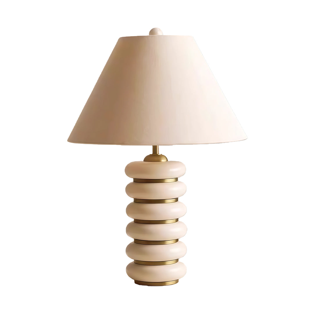Contemporary cloth table lamp featuring glass shade chandelier styling in medium size with natural wood stacked base and neutral shade.