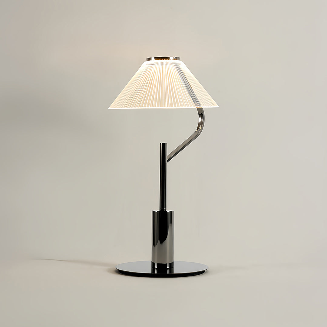 Contemporary craft floor lamp with a white fabric shade and black metal base in a stylish setting