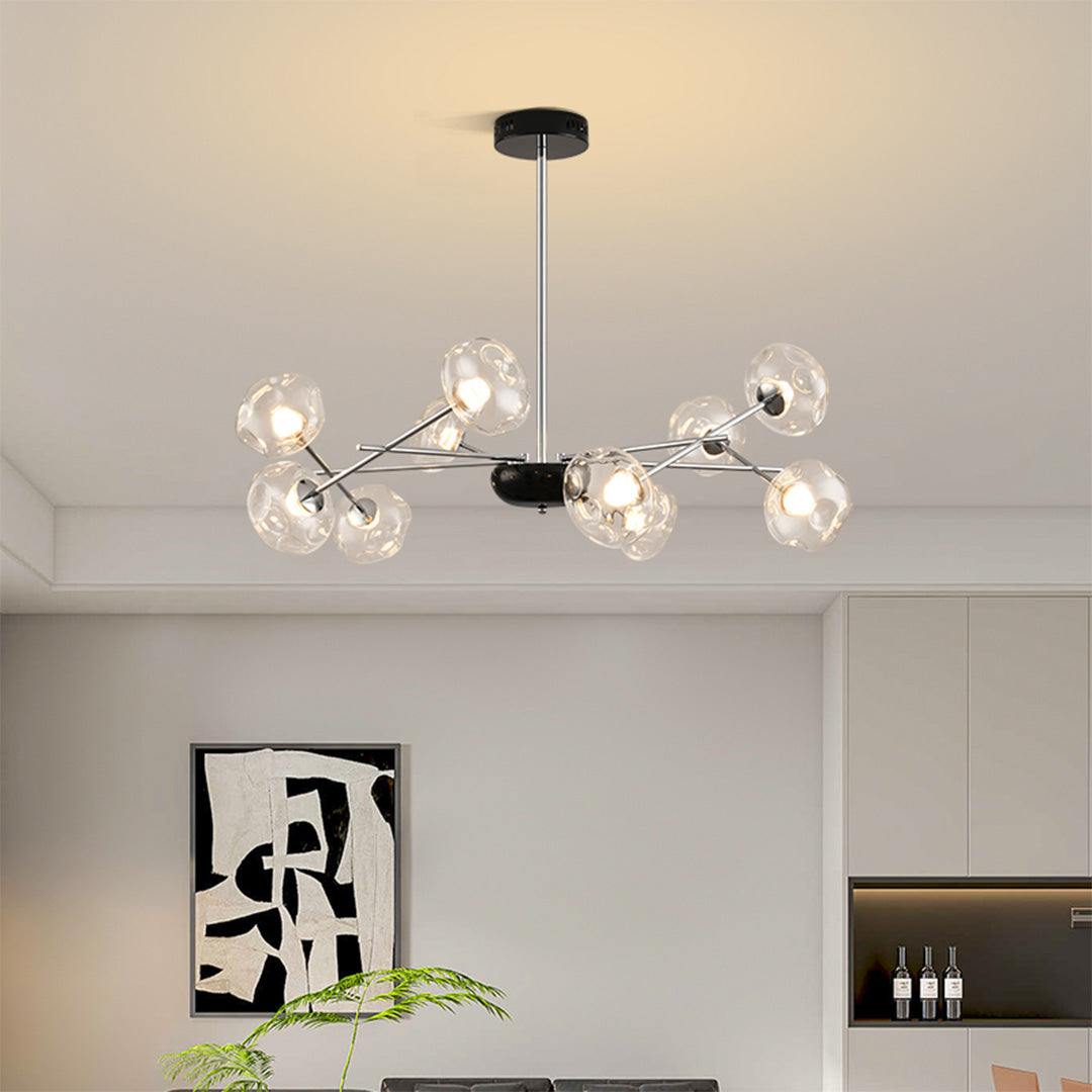 LED chandelier lights creating stunning focal point in contemporary dining area with branching glass design
