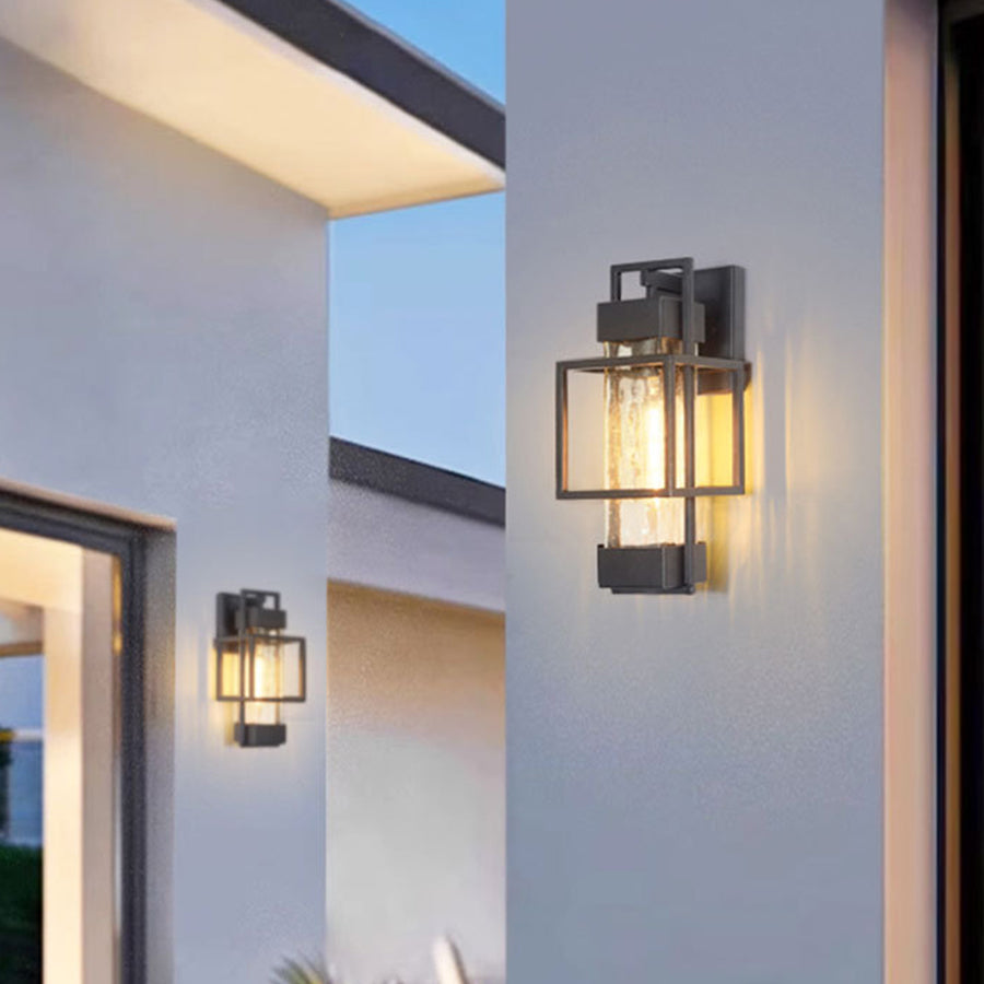 Contemporary black lanterns creating welcoming entrance lighting on modern home exterior