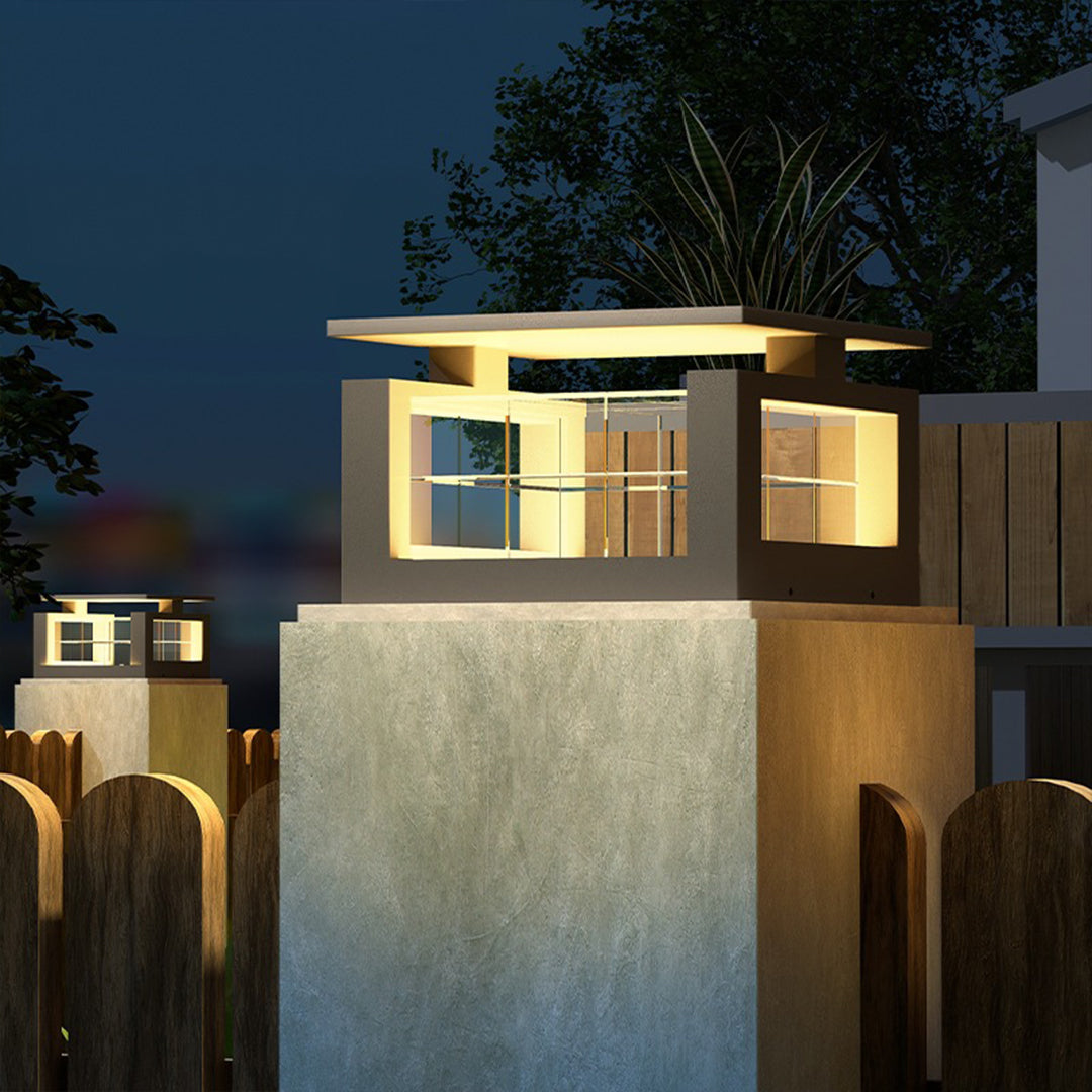 Contemporary building entrance featuring modern square pillar lights creating sophisticated architectural accent lighting