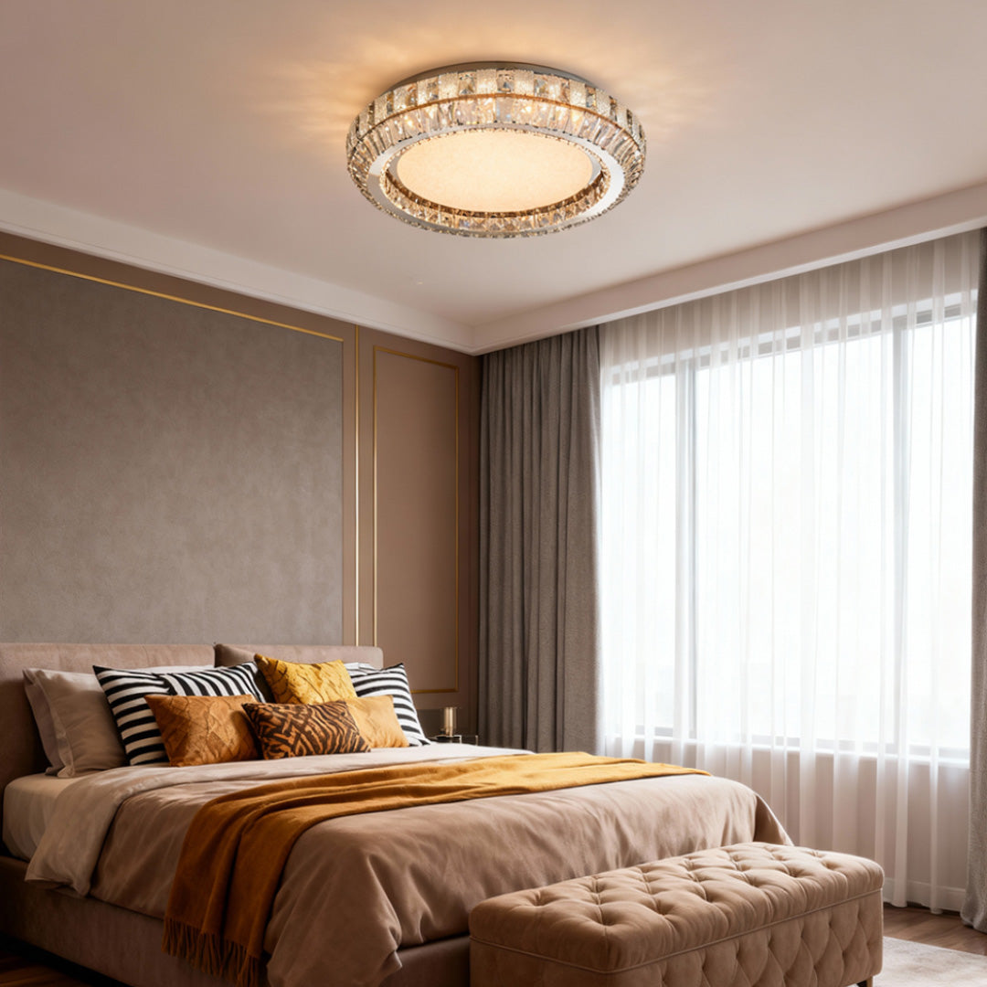 Contemporary flush mount light in a modern bedroom with large windows, offering a stylish focal point.