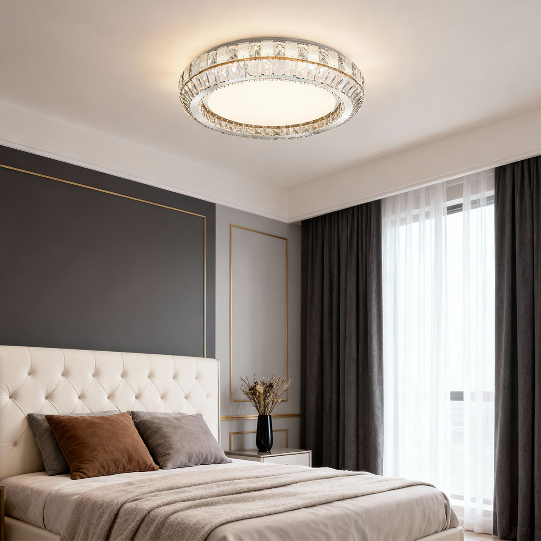 Contemporary flush mount light installed in a modern bedroom with a neutral color palette, providing warm illumination.
