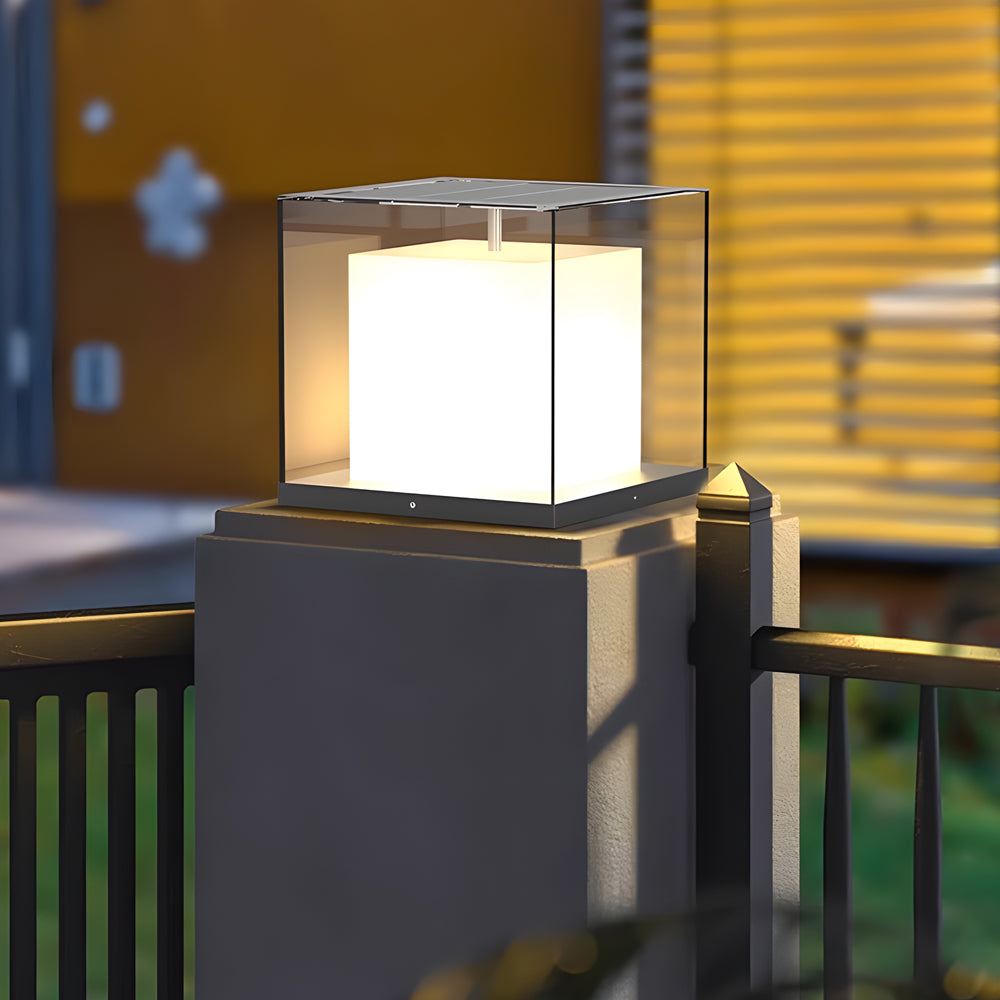 Contemporary gate pillar lights illuminating outdoor entrance with warm white LED glow