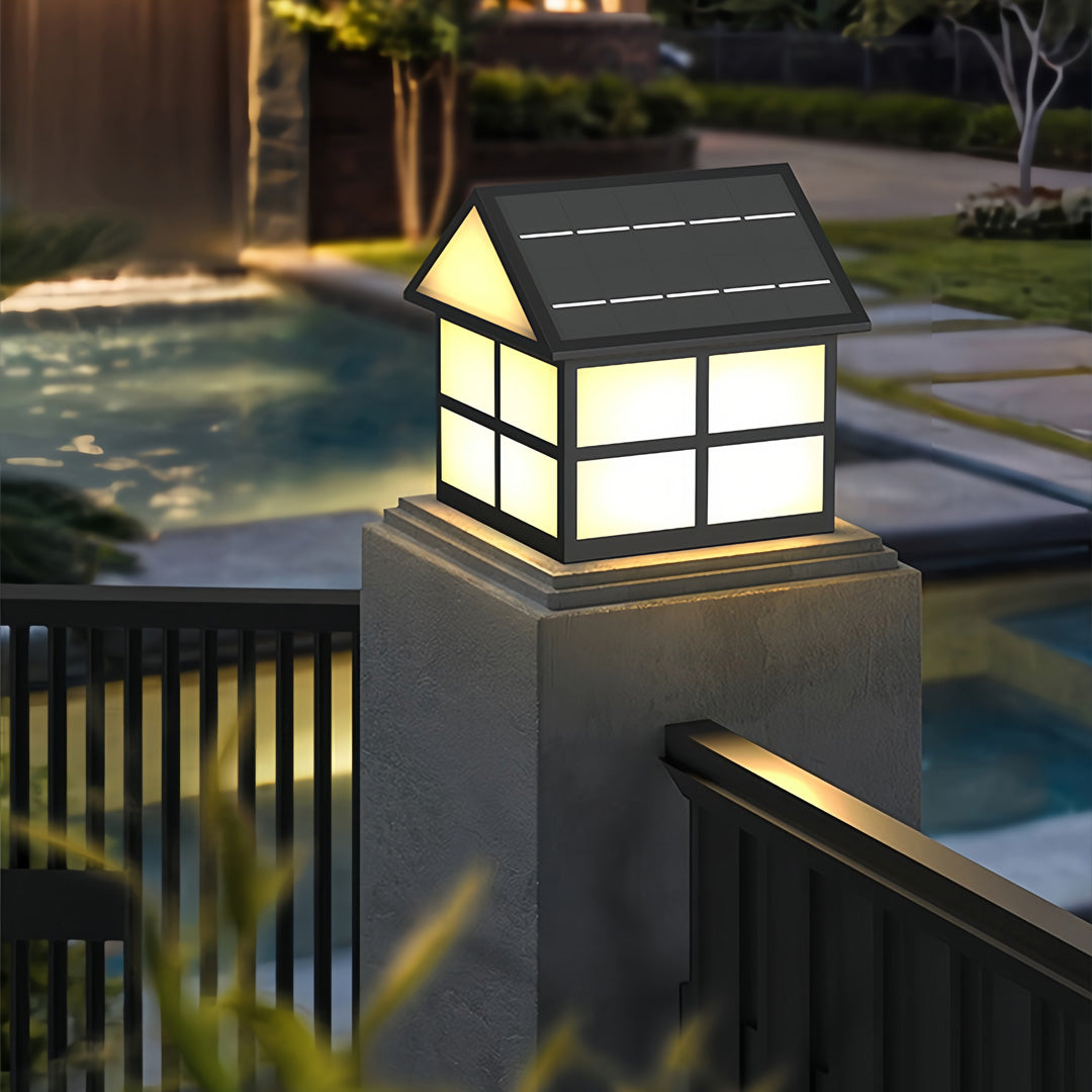 Contemporary exterior pillars fitted with warm gate pillar top lights to enhance walkway and entrance lighting.