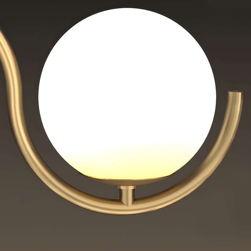 Glass ball linear chandelier with a contemporary design, providing ambient lighting for modern homes.