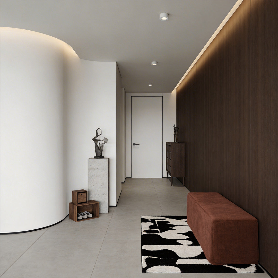 Contemporary hallway featuring surface mounted can lights to accentuate the space.