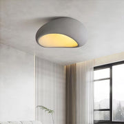 Art deco flush mount ceiling light in a contemporary interior, stylish and functional ceiling lighting